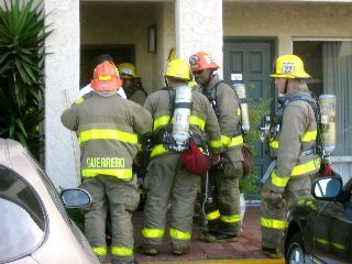 firemen at the door