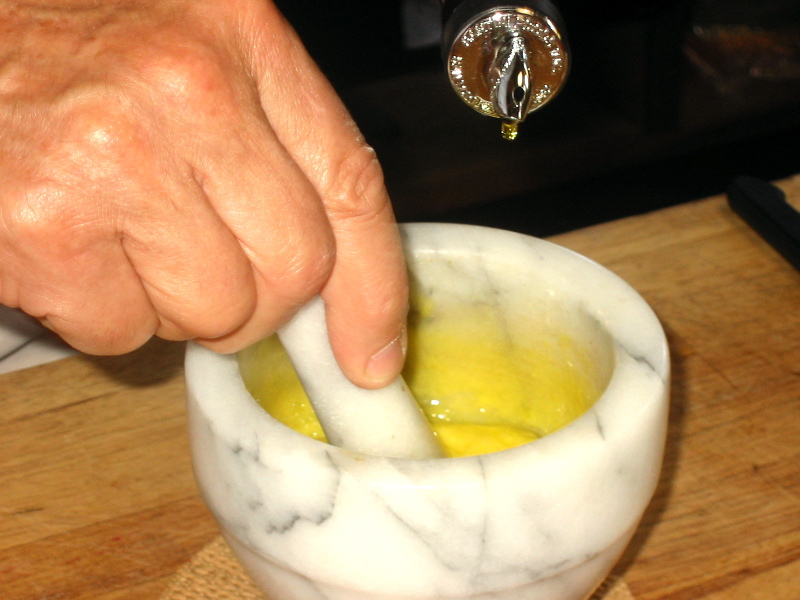 adding the oil