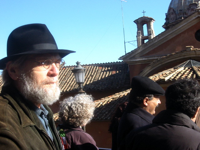 C. meditating on the crowds...